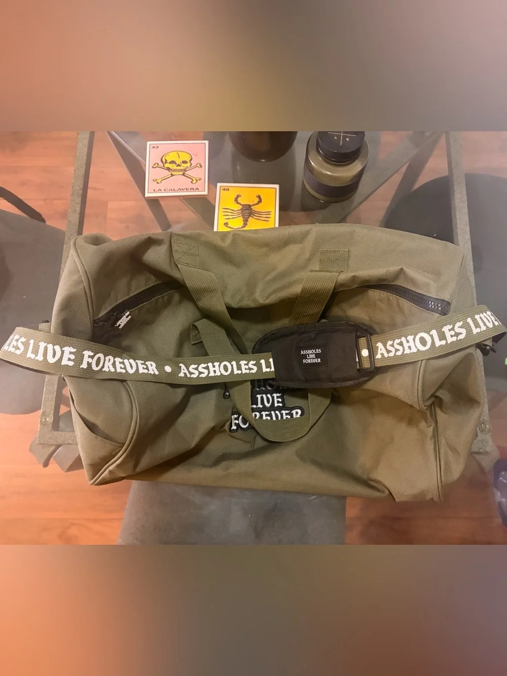 assholes live forever olive green